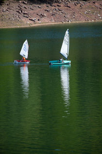 Little boats on a reservoir by safaribears