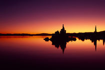 Tufa towers reflect in still Mono Lake by Danita Delimont