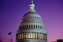Capitol at dusk with light in the dome on by Danita Delimont