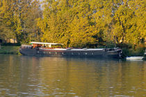 Barge along the shore von Danita Delimont