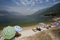 Lake Garda beachgoers by Danita Delimont