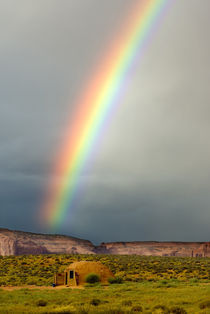 Rainbow over a Navajo hogan by Danita Delimont