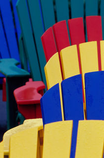 Colorful adirondack chairs by Danita Delimont