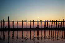 Burma (Myanmar) Silhouette of U Bien's Bridge on Lake Taungthaman at sunset by Danita Delimont