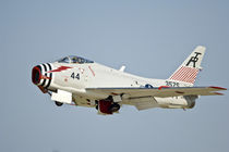 North American Naval FJ2 Fury Jet Fighter flying in the sky by Danita Delimont