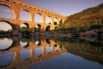 Roman aqueduct/bridge in sunset light by Danita Delimont