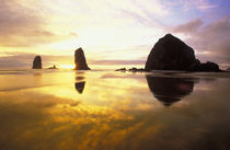 Cannon Beach Sunset with haystack and needle rocks by Danita Delimont