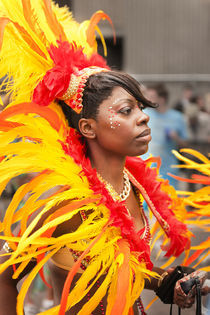 Colourful headgear at the Notting Hill Carnival. by Tom Hanslien