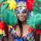 'Very colourful feathery headgear at the Notting Hill Carnival.' von Tom Hanslien