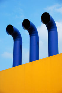 Three chimneys on yellow wall von Sami Sarkis Photography