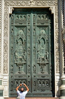 Man picturing main entrance door of Florence Duomo by Sami Sarkis Photography