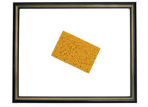 Yellow sponge inside picture frame by Sami Sarkis Photography