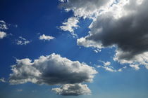 White and gray clouds in blue sky by Sami Sarkis Photography