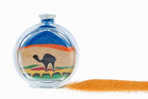 Camel drawni with sand inside a bottle by Sami Sarkis Photography