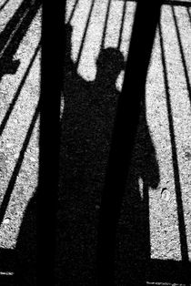Shadow of man behind bars von Sami Sarkis Photography