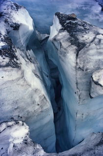 Crevice in the ice at Grinnell Glacier by Sami Sarkis Photography