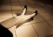 Woman lying on floor by Sami Sarkis Photography