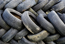 Pile of used car tires by Sami Sarkis Photography