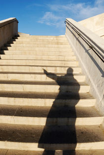 Man casting shadow on steps von Sami Sarkis Photography