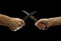 Man and woman fighting with domestic knives by Sami Sarkis Photography