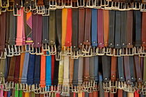 Hanging colorful leather belts by Sami Sarkis Photography