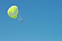 Boy parascending in the sky by Sami Sarkis Photography