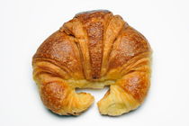 French Croissant on white background by Sami Sarkis Photography