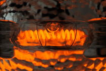 Red Spiral-Wound filament of light bulb by Sami Sarkis Photography