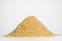 Rice stack on white background by Sami Sarkis Photography