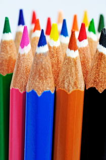 Bunch of standing colorful crayons by Sami Sarkis Photography