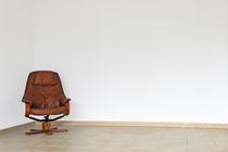 Empty office chair in empty room by Sami Sarkis Photography