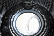 View inside of a washing machine by Sami Sarkis Photography