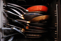 Stack of saucepan inside oven by Sami Sarkis Photography