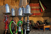Assorted hookahs pipes (hubble-bubble) at beach restaurant by Sami Sarkis Photography