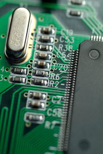 Integrated circuit on a computer USB board. by Sami Sarkis Photography