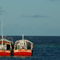 Rf-anchored-boats-fishing-maldives-rippled-rusty-sea-mld0001