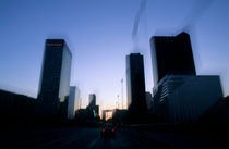 Skyscrapers of La Défense seen from a moving vehicle by Sami Sarkis Photography