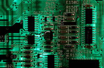 Integrated circuit board from a computer. by Sami Sarkis Photography