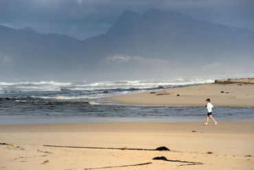Woman-running-jogging-beach-alrm-saa-fna6747