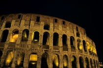Colosseum illuminated at night by Sami Sarkis Photography