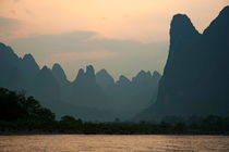 Looking across the Li Jiang River at the limestone mountain peaks between Xinping and Yangshuo by Sami Sarkis Photography