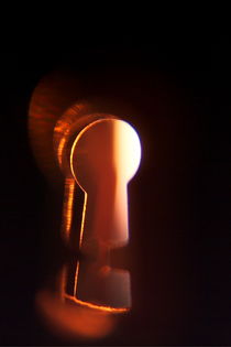 Light peeking through a keyhole. by Sami Sarkis Photography