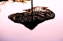 Reflection Of A Parasol In The Water At Sunset von Sami Sarkis Photography