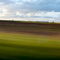 Rf-blurry-fields-landscape-pastures-rural-vehicles-fra717