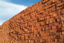 Stacked bricks forming a solid wall by Sami Sarkis Photography