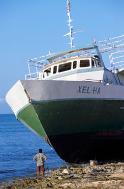Rm-beached-cozumel-man-sea-ship-waters-edge-mex508