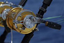 Two rod and reels on board a game fishing boat in the Mediterranean Sea by Sami Sarkis Photography