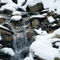 Rm-flowing-water-rocks-snow-stream-var561
