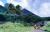 Melanesian boys walking by Yasur volcano by Sami Sarkis Photography