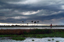 Boy Walking in a Storm Kerala by serenityphotography